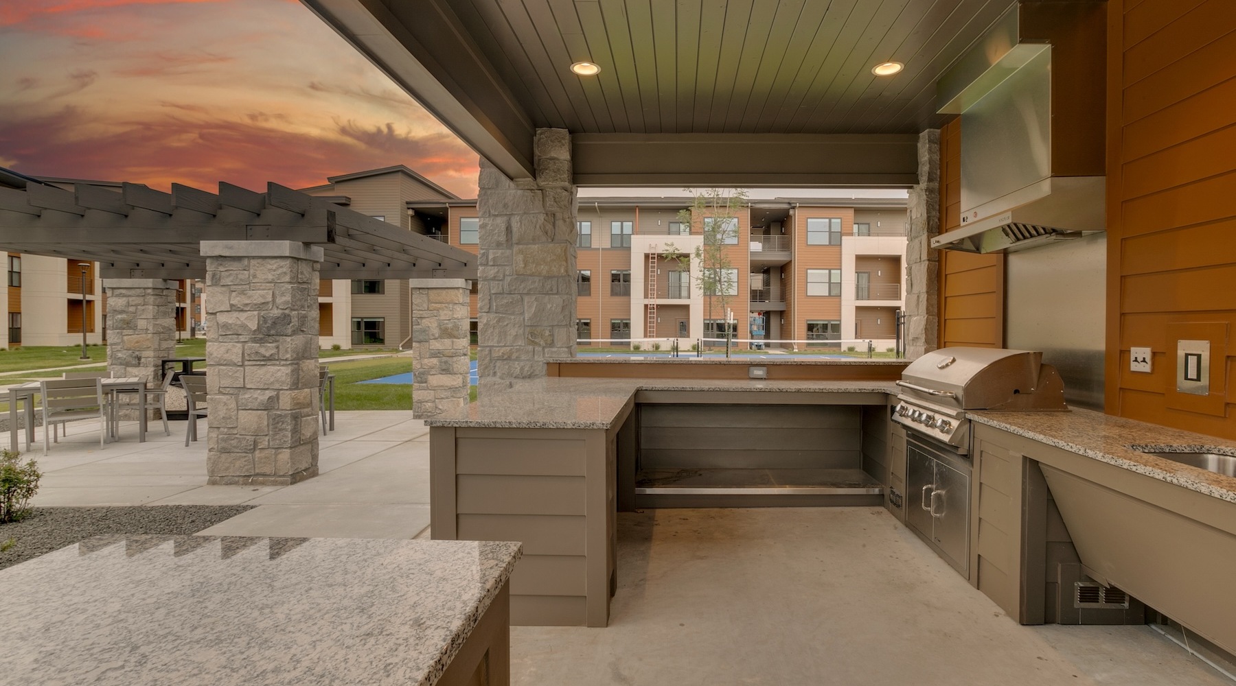 Grilling station and lush landscaping
