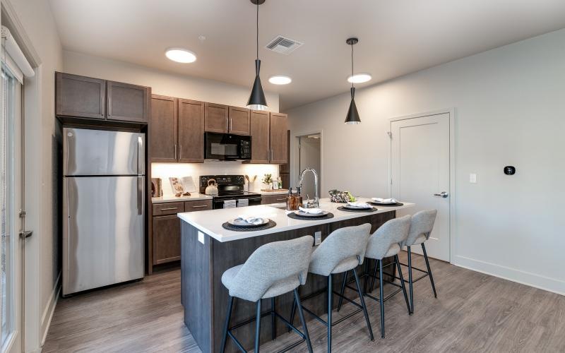 a kitchen with a dining table