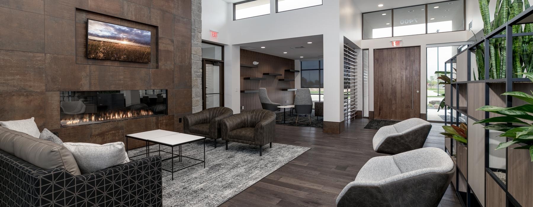 a living room with a large glass wall
